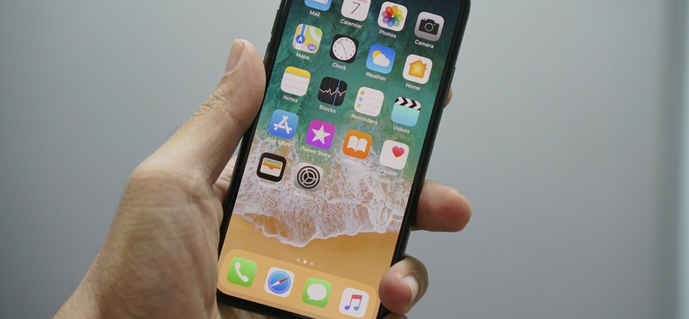 person holding space gray iPhone 7