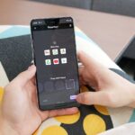 person holding black android smartphone