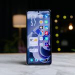 a close up of a cell phone on a table