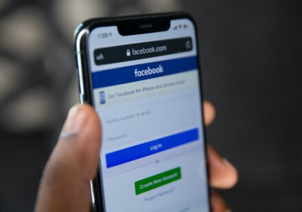 person holding silver iphone 6