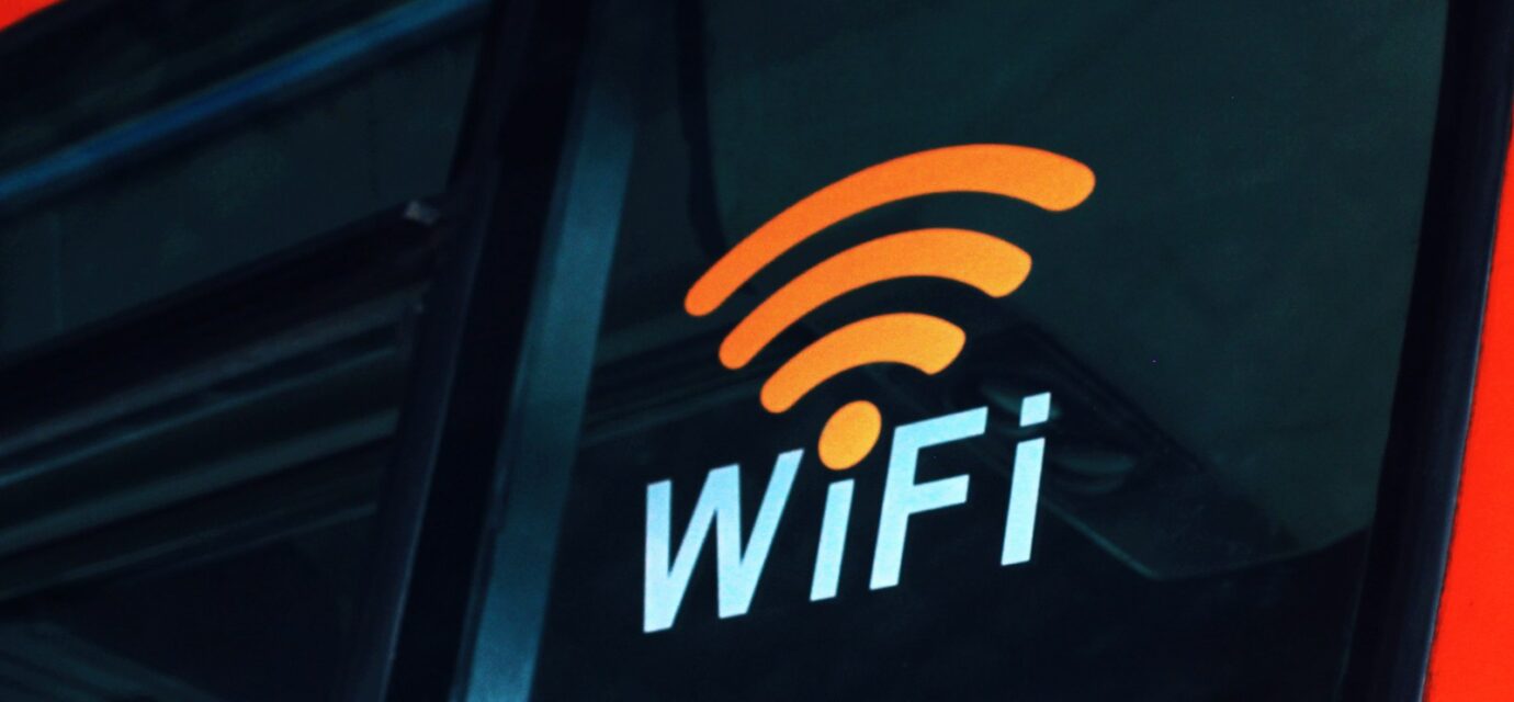 a close up of the wifi logo on the side of a bus