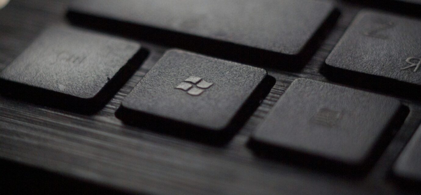 black laptop computer keyboard in closeup photo
