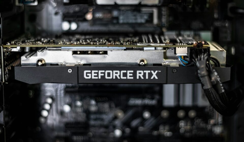 selective focus photography of GEFORCE RTX graphics card