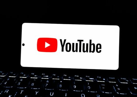 Youtube logo displayed on a smartphone screen.