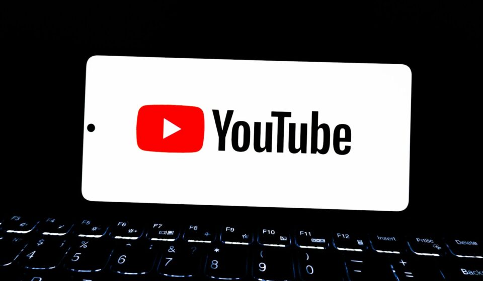 Youtube logo displayed on a smartphone screen.