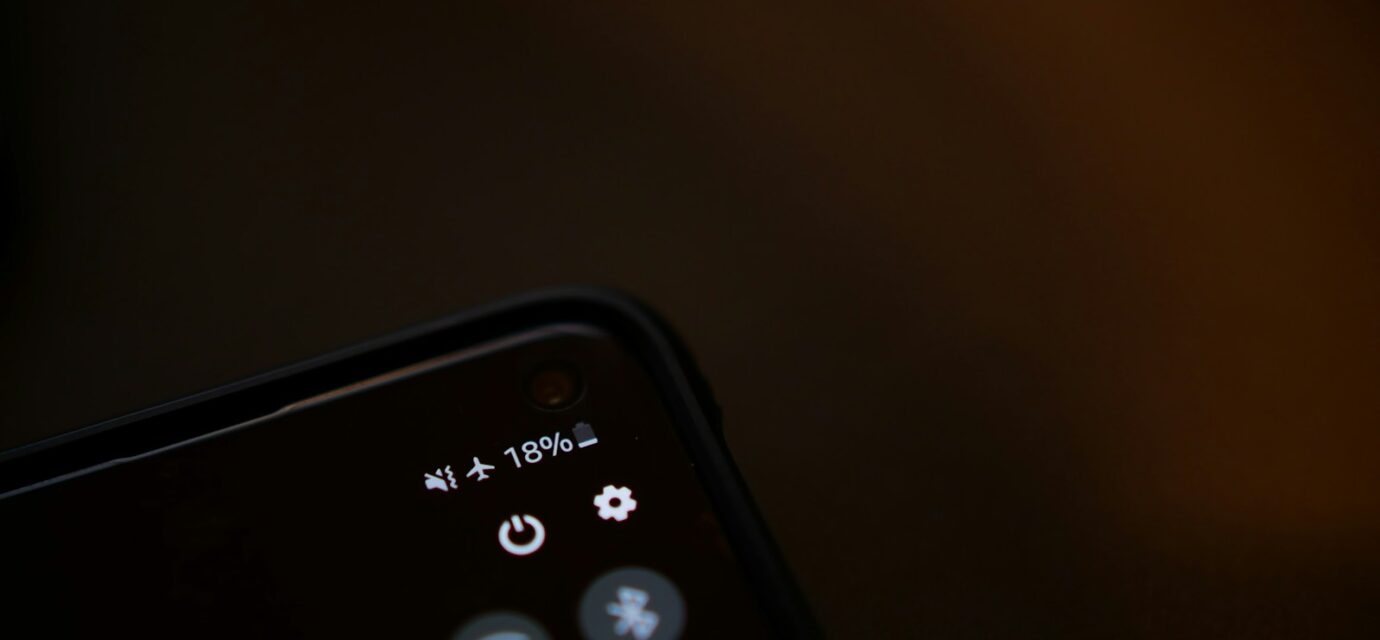 black remote control on white surface