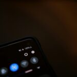 black remote control on white surface