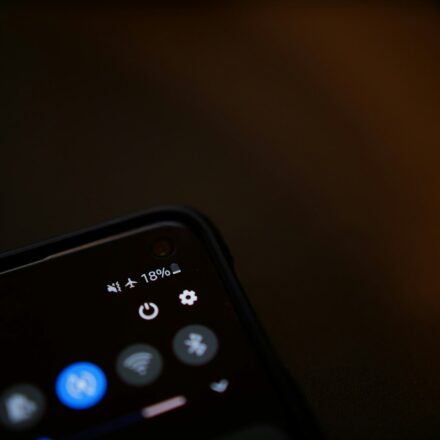 black remote control on white surface