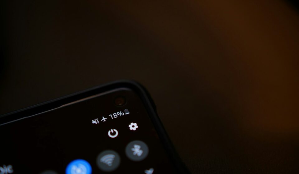 black remote control on white surface