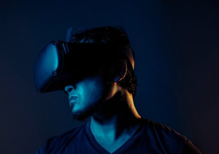 man in black crew neck shirt wearing black headphones