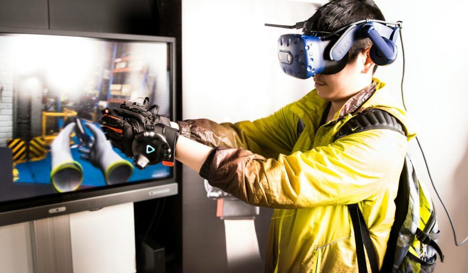 man in yellow jacket wearing black goggles