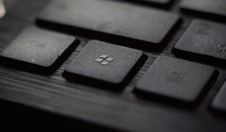 black laptop computer keyboard in closeup photo