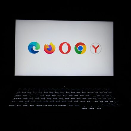 Browser logos displayed on a laptop screen.